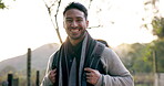 Happy asian man, backpack and travel in nature for holiday vacation or weekend getaway outdoors. Portrait of male person, tourist or hiker smile for fitness, hiking or trekking journey in the woods