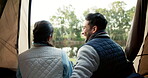 Back, nature and a couple camping by the lake in the forest for love, romance or weekend getaway together. Freedom, travel or hiking with a man and woman sitting in a tent while bonding over a view