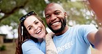 Happy interracial couple, volunteer and selfie for photograph, memory or vlog together in nature. Portrait of man and woman smile in diversity for photo, memory or social media in teamwork outdoors