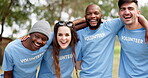 Happy people, volunteer and hug in nature for teamwork, eco environment and unity together. Portrait of group in diversity or huddle in support, community or trust for cleaning pollution in the park