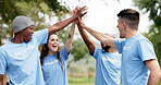 People, high five and volunteer teamwork in nature for eco friendly environment, success or mission outdoors. Diversity and group touching hands in team building, unity or collaboration in the park