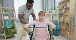 Woman with disability, physiotherapy and stretching band for healthcare, muscle rehabilitation or physical therapy service. Clinic, physiotherapist and medical support of senior patient in wheelchair