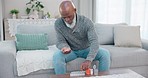 Container, senior black man and organise pills tablet, health medication or pharmaceutical prescription. Home sofa, medical supplement drugs and African elderly person set daily healthcare medicine