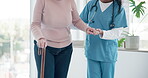 Caregiver hands, disabled and old woman with walking stick for support, senior wellness care or movement disability. Elderly rehabilitation service, retirement home and nurse help patient with cane