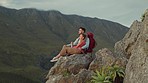 Hiking, mountain and view, couple relax on outdoor adventure and peace in nature with romance. Trekking, rock climbing and love, man and woman with view of natural landscape sitting on cliff together