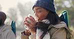 Nature, calm and woman drinking coffee in the morning at an outdoor camp site on a weekend trip. Happy, peace and young female person enjoying a warm cappuccino while relaxing in a forest on holiday.