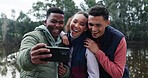 Friends, camping and laugh selfie with a smile and hug outdoor with freedom and adventure in nature. Funny, young people and travel picture for vacation in a forest and lake online for social media