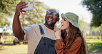 Interracial, people and selfie, camping in nature with happiness and social media post of couple of friends. Live streaming, adventure and memory, black man and woman outdoor with smile in picture