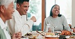 Family, man and women laughing with food in house social gathering, holiday lunch and celebration dining. Smile, happy and people group with healthy meal in home for dinner hosting and funny joke