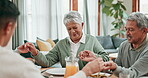 Senior man, woman and family praying for food at dinner table for thanksgiving at home. Group of people talking in worship, prayer or thanks for eating lunch meal, respect or gratitude in dining room