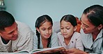 Mom, dad and kids reading books in bedroom for learning, childhood development and relax. Mother, father and storytelling with happy girl children for quality time, love and together in family home