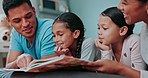 Mother, father and smile with children, reading books and language development in bedroom. Happy mom, dad and storytelling with girl kids for quality time, love and funny conversation in family home