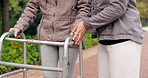 People, support and walking frame in park or outdoor wellness, exercise and physiotherapy. Person with disability in garden or nature with helping hands for physical therapy, muscle fitness or cardio