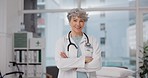 Portrait, woman and doctor with arms crossed, confidence and happiness with healthcare consultant, hospital and career. Medical professional, female person or happy lady with success, proud and smile