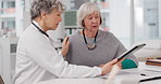 Senior woman, doctor and tablet with patient in consultation for healthcare advice or checkup at hospital. Mature medical professional talking to elderly customer on technology for medicare at clinic