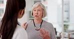 Healthcare, shoulder pain and an old woman with her doctor in the hospital, talking during a consultation. Medical, insurance or anatomy and a senior patient in a clinic with a medicine professional