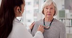 Woman, doctor and heart beat of elderly patient in checkup, appointment or consultation at hospital. Medical healthcare expert examining mature customer in cardiology with stethoscope at the clinic