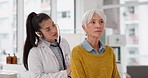 Healthcare, listening and a doctor with a woman for breathing check during a consultation. Talking, help and a medical employee with a stethoscope and senior patient for a heart test at a clinic