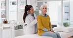 Healthcare, talking and a doctor with a woman for breathing check during a consultation. Service, help and a medical employee with a stethoscope and senior patient for a heart test at a clinic