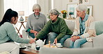 Senior women, tea and friends talking on home sofa for quality time, chat or reunion party. Elderly people or group with a caregiver at a table for food, social visit and retirement lifestyle