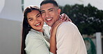 Couple, love and happy portrait outdoor in a backyard with happiness, care and quality time. Young man and woman from Portugal laughing, hug and together at a house while bonding for healthy marriage