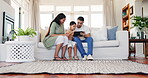 Family, tablet and relax on a sofa in home living room, bonding together and streaming movie, online video or film. Mother, father and child on couch with technology for learning, internet or web app