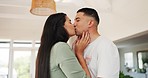 Kiss, couple and dance in home for love, care and bonding together in house. Man, happy woman and moving with intimate romance to music, commitment for marriage and date celebration in living room