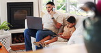 Father, laptop and phone call with child on a sofa in home living room for communication, conversation or talking. Tablet, kid and dad with smartphone for remote work on couch, technology or internet