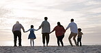 Family, silhouette and holding hands at the beach on a holiday, vacation or people jump together in the sea, waves or ocean view. Travel, love and shadow of group with freedom, celebration or support
