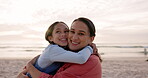 Mother, child and hug outdoor at beach on family vacation, holiday or adventure at sunset. Woman and happy girl kid embrace and thinking at ocean with quality time for love, comfort or care in nature