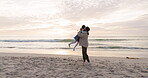 Grandmother, child and family hug at beach for fun vacation, holiday or adventure at sunset. Girl kid running to senior woman at ocean for quality time or embrace with love and care outdoor in nature