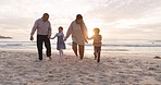 Family, beach and holding hands with parents and children on sand with freedom and travel outdoor. Holiday, sunset and sea adventure with kids, mom and dad together on vacation by ocean with smile