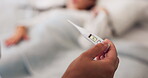 Mother, hands and thermometer of sick child in bed with fever, temperature or flu at home. Closeup of mom holding temp measuring tool with ill kid lying in bedroom for recovery, illness or infection