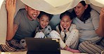 Tablet, parents and children in bed for horror movie at night, streaming television show and scared at home. Mom, father and kids in bedroom to watch tv, relax and bonding with online thriller video.