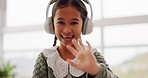 Girl child, wave and video call for online class, smile or face for education, communication or respect. Kid, portrait and headphones with greeting, kindness or happy for webinar, elearning or school