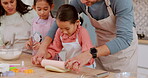 Learning, father and children baking with parents in a home kitchen counter together to prepare dessert as a skill. Mother, mother and dad teaching or helping kids with a cookies recipe or food