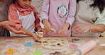 Grandmother, mom and children learning baking in a home kitchen counter together to prepare dessert as a skill or care. Family, mother and girls teaching or helping kids with a cookies recipe or food