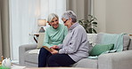 Senior, women and holding photograph on sofa in nursing home for conversation. Happiness, retirement and memory with elderly female on sofa with friends or photo frame with smile or talk together.