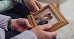 Memory, frame picture and senior hands talking and bonding due to grief after funeral, death or loss in a home. Discussion, talking and elderly people with love, care and hope for family and talking
