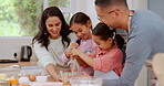 Learning, family and kids baking with parents in a home kitchen counter together to prepare dessert as a skill. Cooking, mother and father teaching or helping children with a cookies recipe or food