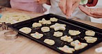 Kitchen hands, cookie or kids decoration, bake or prepare dessert, candy or sweets with rainbow sprinkles. Child development, closeup parent help or young family children learning home cooking skills