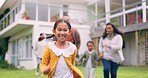 Children, family and running outdoor in a backyard with a smile, happiness and energy. A happy young girl kid and parents together for fun game, chase or race and quality time at a holiday house
