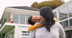 Kiss, piggyback and a mother with a child outdoor in a backyard with care, happiness and love. Woman and girl kid or happy family together for quality time, fun game and bonding or affection at home