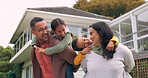 Happy family, outdoor and parents piggyback children in backyard with love and care. Man, woman and girl kids together for quality time, fun game and bonding or conversation at a holiday home