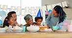 Family, birthday party and cake with celebration, happiness and singing with candles, home and decorations. Children, mother and father with grandparents, kids and exited with joy, clapping and event