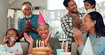 Birthday, party and an old woman with her family at home clapping together in celebration of a life milestone event. Kids, parents and grandparents with cake in a house to celebrate an senior grandma