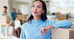 Woman, moving a box and thinking about new house, family home or vision for living room furniture or future interior design. Happy, face and smile with cardboard, boxes and people helping to move in