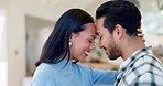 Happy couple, forehead and hug for love, care or compassion together in new home or property. Man and woman smile for loving relationship, commitment and touching heads in romance and happiness