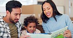 Happy parents, child and reading books in home for learning, language development and family bond. Father, mother and boy kid relax for quality time, dinosaur storytelling and discussion together