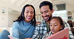 Happy, learning and a family reading a book for education, child development and bonding. Laughing, care and young parents with a girl kid and a story together in the living room of a home for love